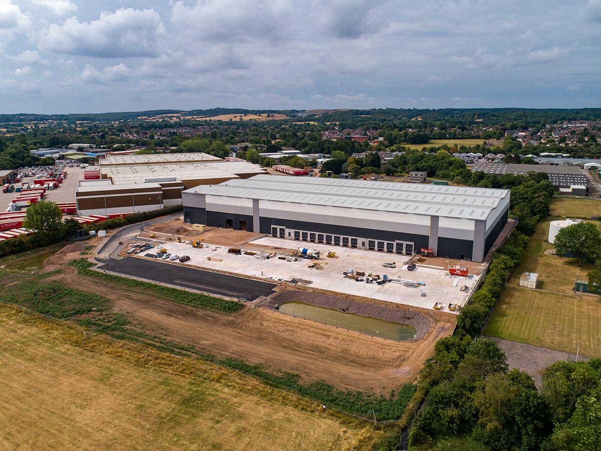 Aerial shot of Industrial Building, surrounded by grass plains, Atherstone, Pioneer Design & Build